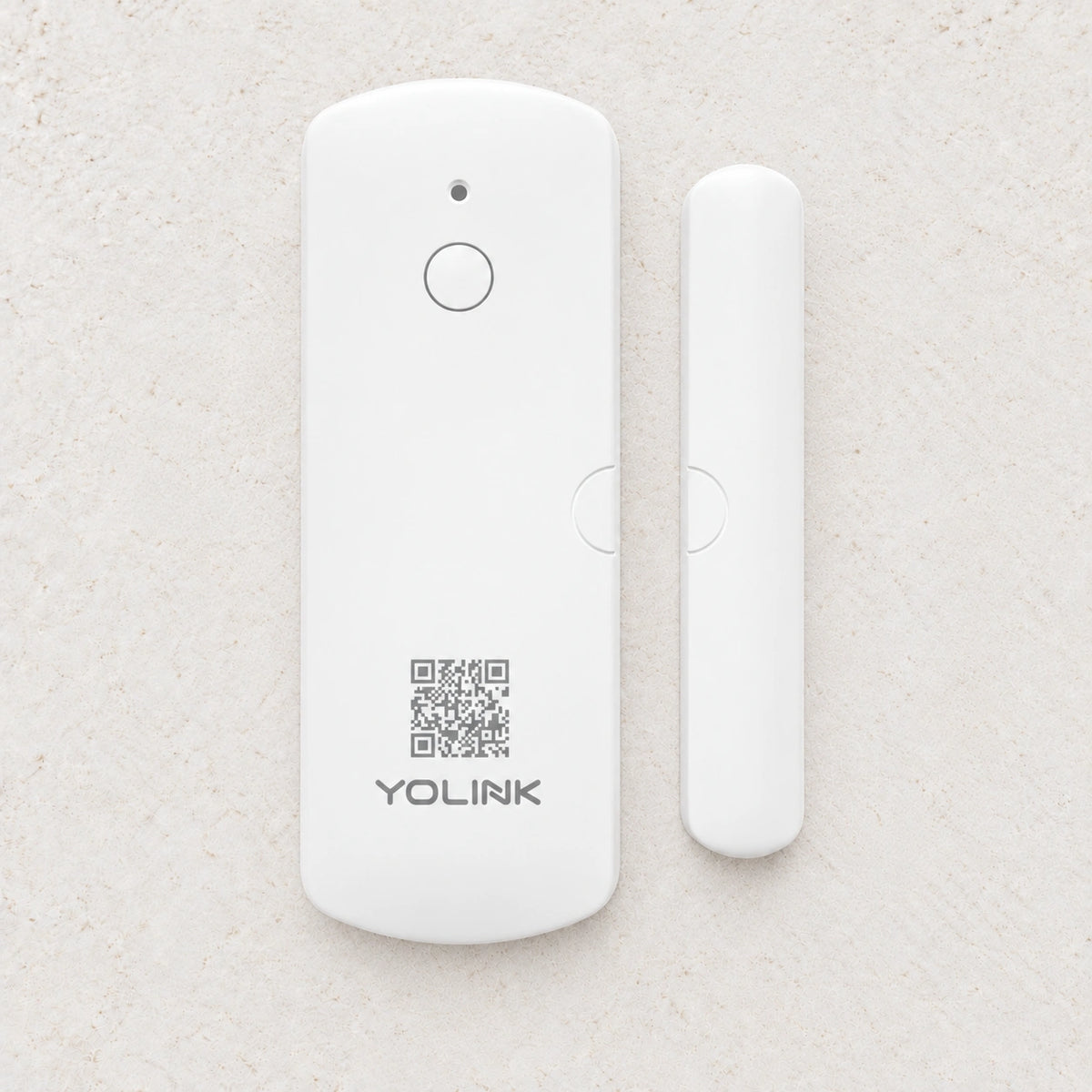 YoLink Door Sensor — arranged product-only photograph on a subtle white textured surface