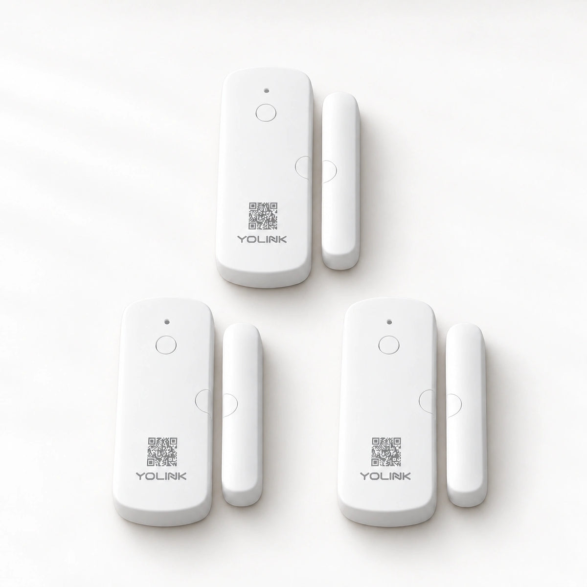 YoLink Door Sensor, 3-Pack — product-only photograph on smooth neutral off-white with soft diffused daylight shadows