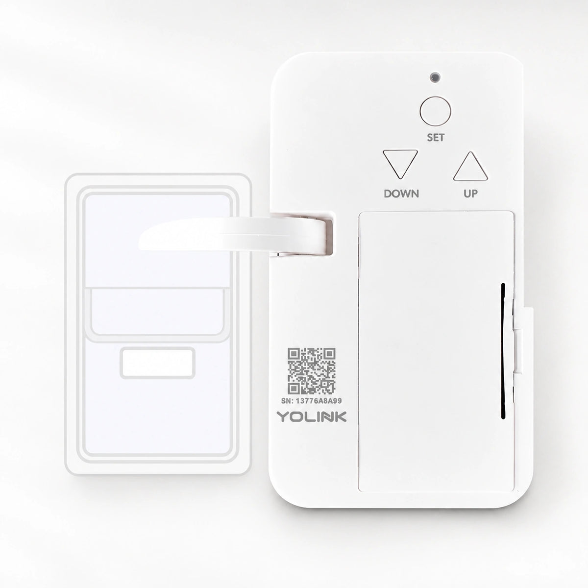 YoLink Finger Garage Door Controller — product-only photograph on smooth neutral off-white with soft diffused daylight shadows