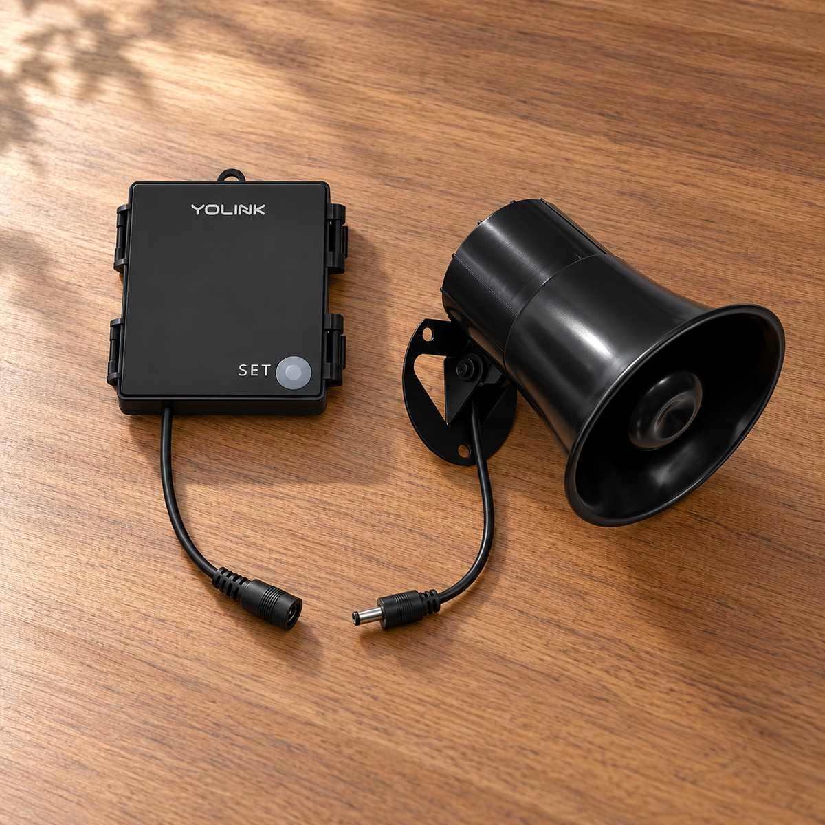 YoLink Outdoor Alarm Controller and 110 dB Siren Kit — arranged main components