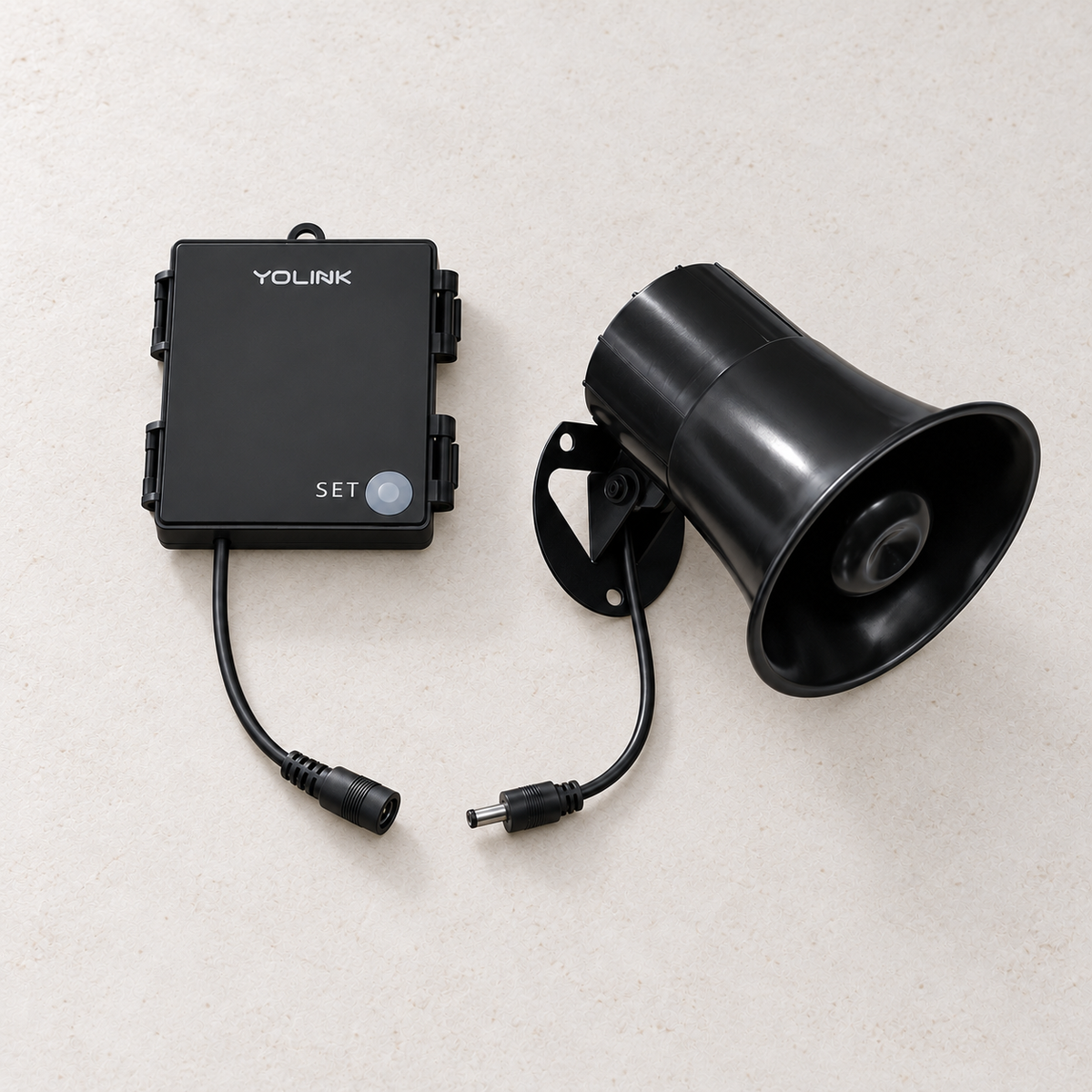 YoLink Outdoor Alarm Controller and 110 dB Siren Kit — arranged main components