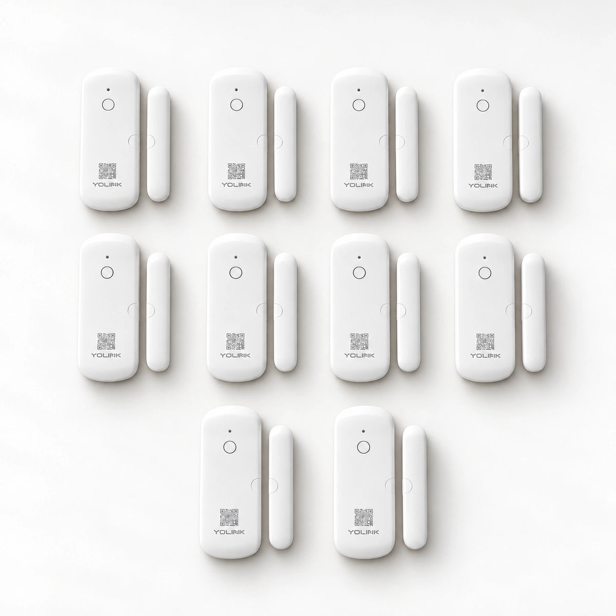 YoLink Door Sensor, 10-Pack — product-only photograph on smooth neutral off-white with soft diffused daylight shadows
