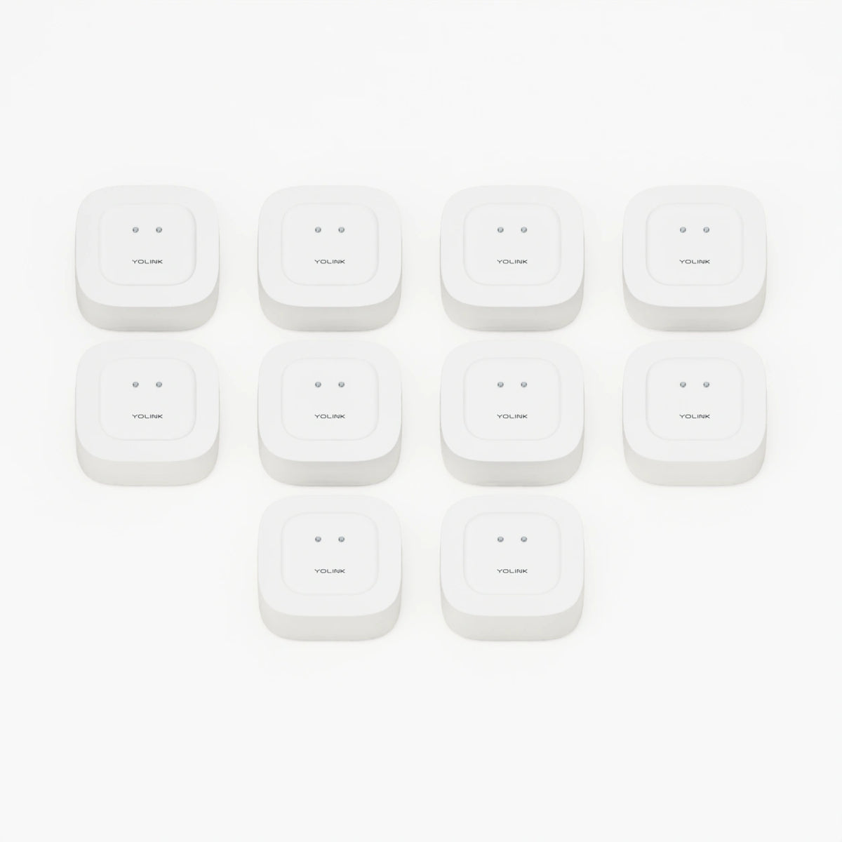 YoLink Water Leak Sensor 1, 10-Pack — product-only photograph on smooth neutral off-white with soft diffused daylight shadows