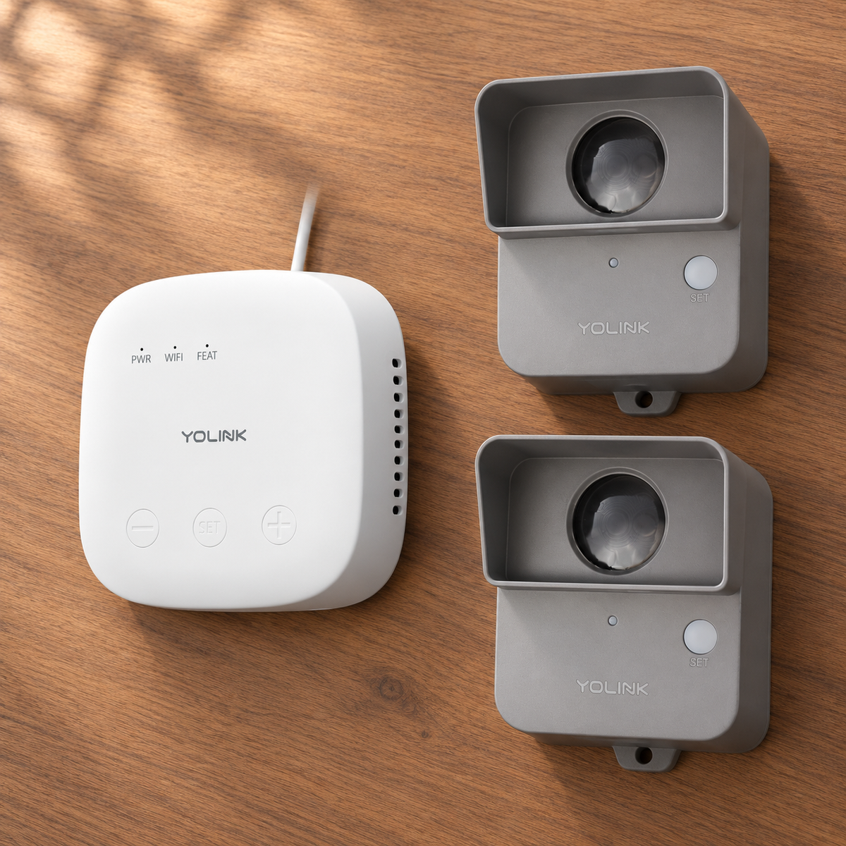 YoLink Outdoor Motion Sensor Starter Kit — SpeakerHub + 2 Sensors — arranged main components