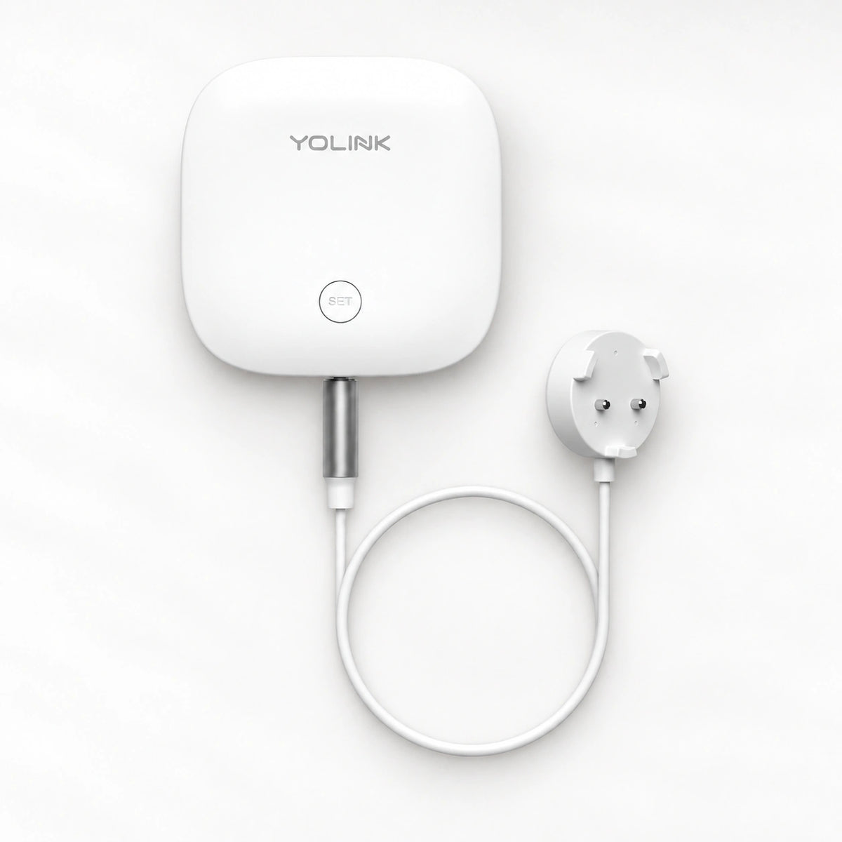 YoLink Water Leak Sensor 3 — product-only photograph on smooth neutral off-white with soft diffused daylight shadows