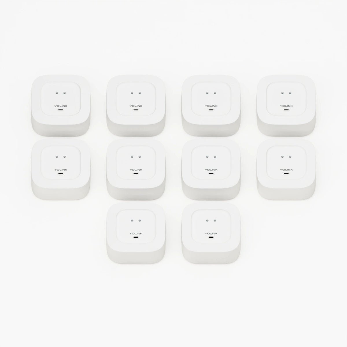 YoLink Water Leak Sensor 4, 10-Pack — product-only photograph on smooth neutral off-white with soft diffused daylight shadows