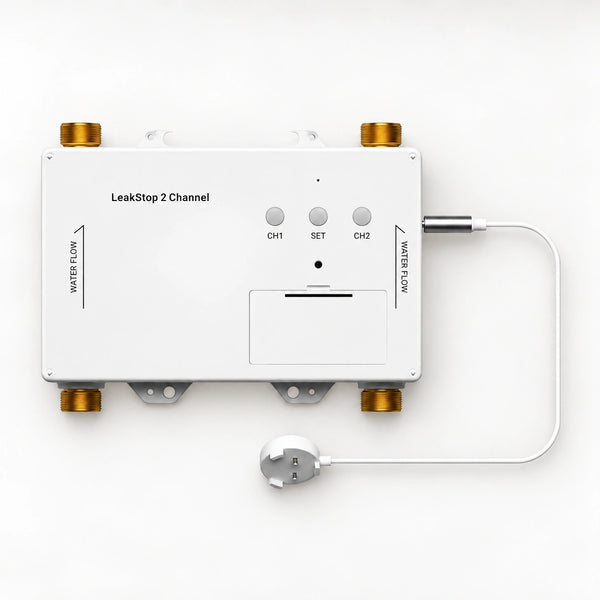 YoLink LeakStop 2-Channel Leak Detector — product-only photograph on smooth neutral off-white with soft diffused daylight shadows