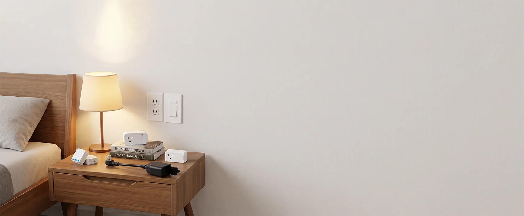Smart plug beside a bedside lamp